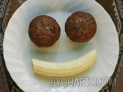 marc moritsch smiling breakfast of muffins and a banana