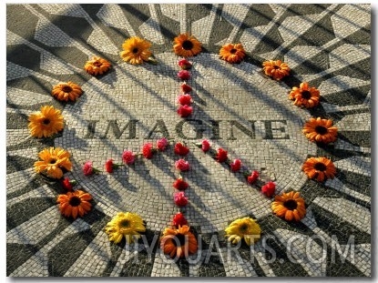 A Makeshift Peace Sign of Flowers Lies on Top John Lennon