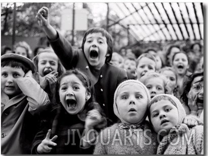 Wide Range of Facial Expressions on Children at Puppet Show the Moment the Dragon is Slain