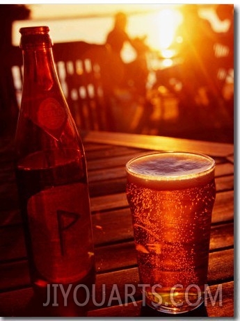 Bottle and Glass of Beer by Lake Vattern at Sunset, Motala, Ostergotland, Sweden