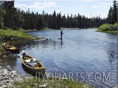 Fishing by a River