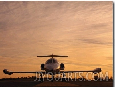 Twilight View of a Lear Jet on the Runway