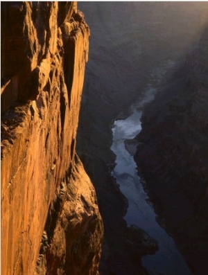 Sandstone Cliff and Colorado River at Sunrise, Toroweap, Grand Canyon National Park, Arizona, USA