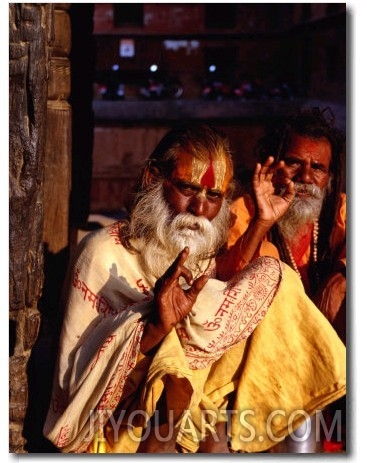 Portrait of Two Sadhus Making Hand Signals in Taumadhi Square, Bhaktapur, Nepal