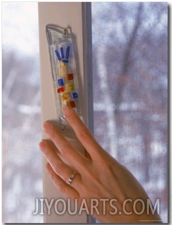 Hand Touching Mezuzah