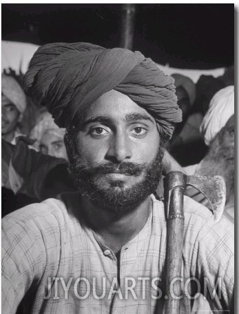 Sikh Listening to Speaker at Rally for a Protest March Regarding Irrigation in the District