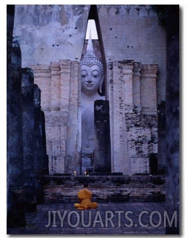 Monks Meditating in Front of Large Buddha Statue at Wat Si Chum, Sukhothai, Thailand