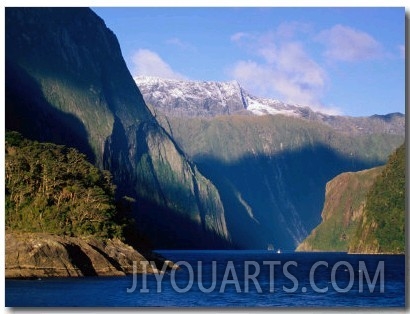 Boat in Distance Between Mountains, Milford Sound, New Zealand