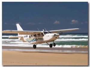 Plane About to Land on Seventy Five Mile Beach, Queensland, Australia