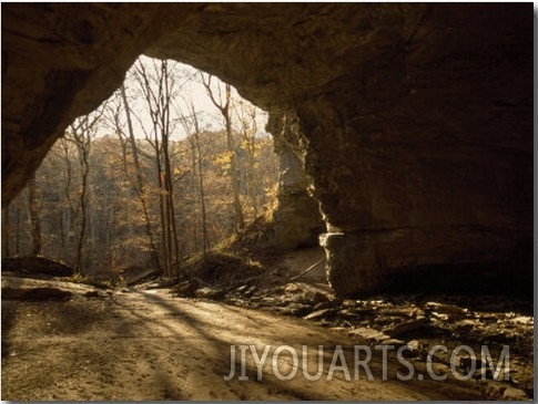 Caver Rappels the Entrance Drop of a 150 Foot Deep Cave Pi