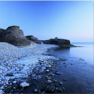 Pebbles, Stones and Cliffs by the Sea