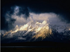 Storm Clouds Over Snow Capped Mountain, Grand Teton National Park, USA