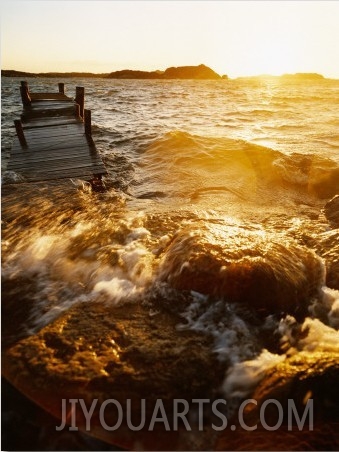 High Tide, Sea Flowing over a Jetty and Some Rocks