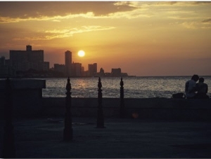 A Couple Embraces on Havanas Malecon