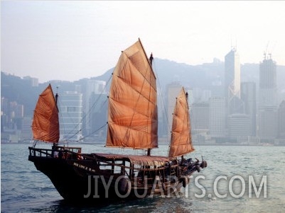 Duk Ling Junk Boat Sails in Victoria Harbor, Hong Kong, China